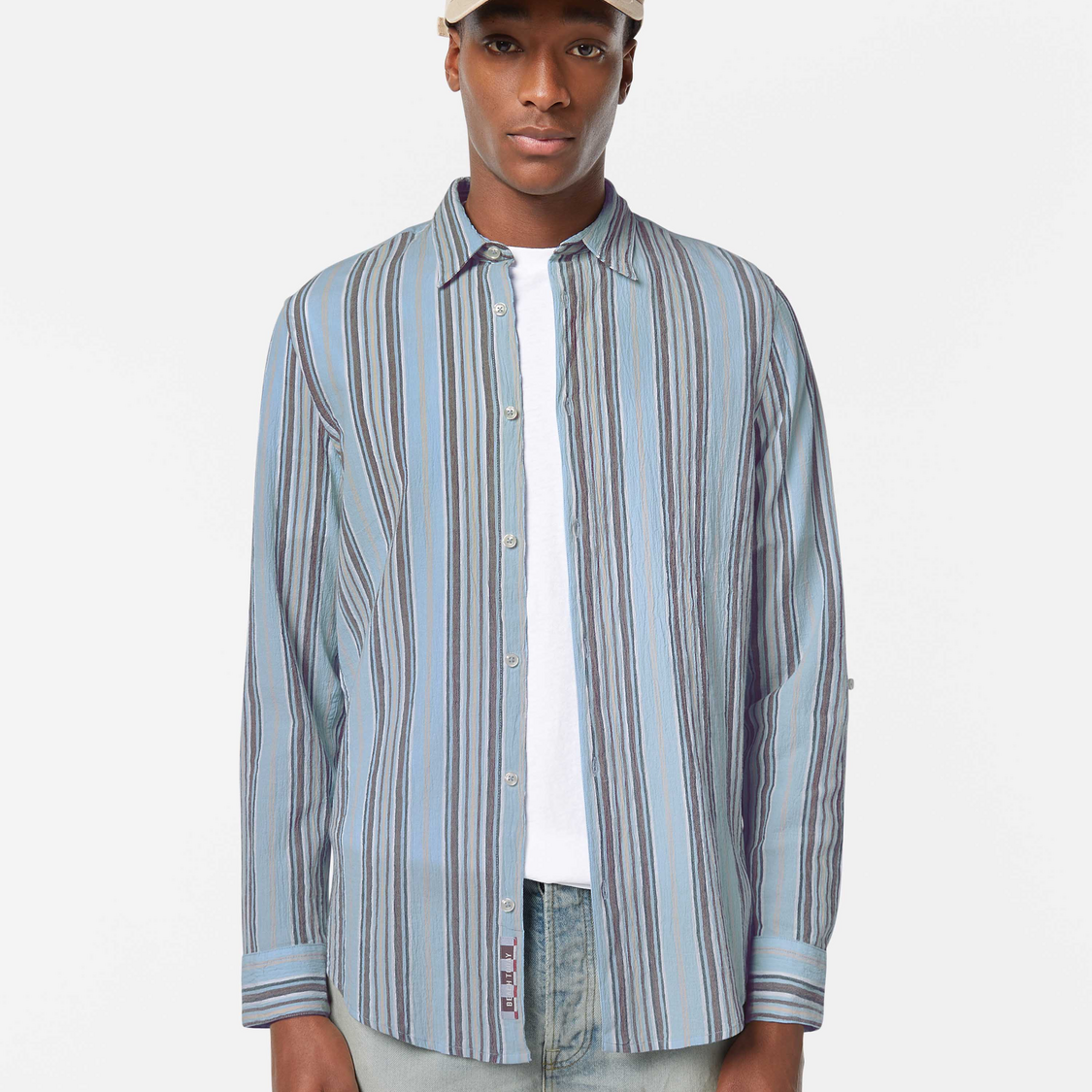 Designed for effortless style, this crinkle-stripe shirt offers a textured finish with a relaxed fit.
100% Cotton