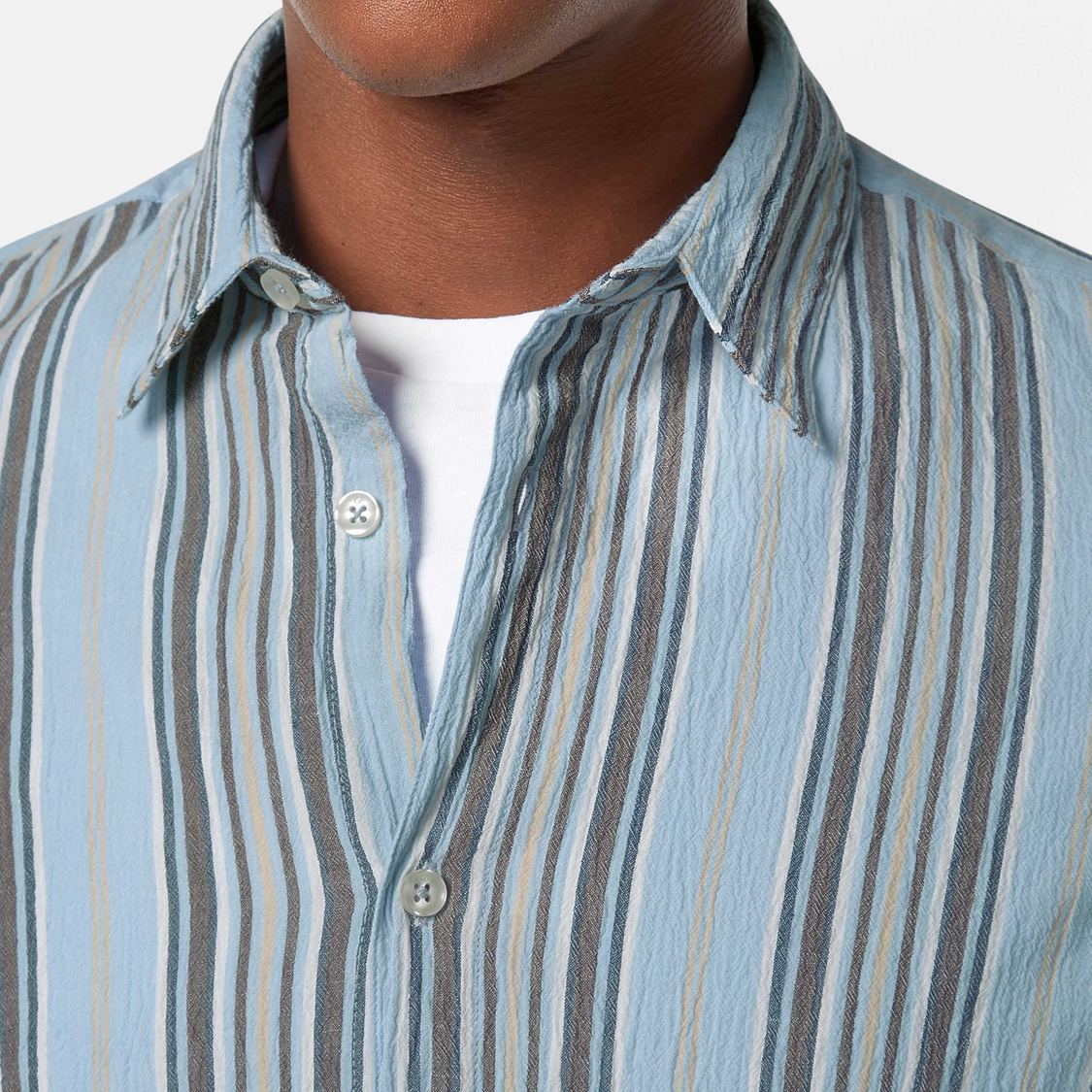 Designed for effortless style, this crinkle-stripe shirt offers a textured finish with a relaxed fit.
100% Cotton