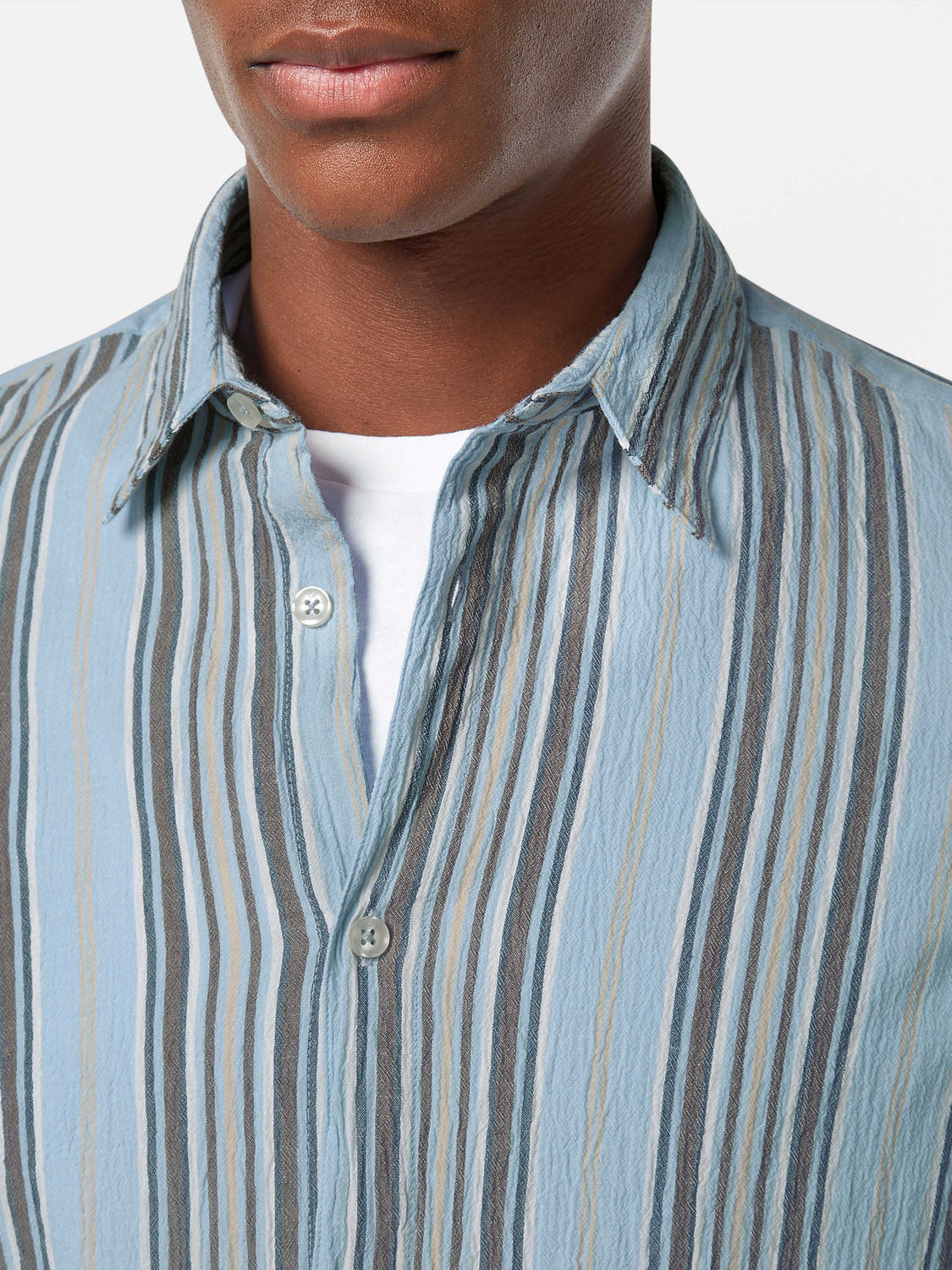 Designed for effortless style, this crinkle-stripe shirt offers a textured finish with a relaxed fit.
100% Cotton