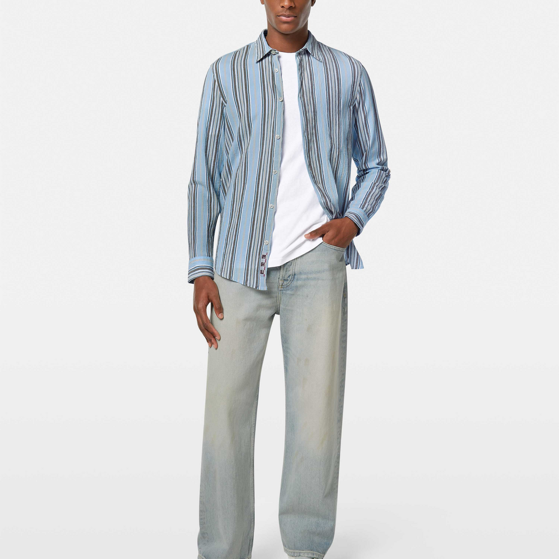 Designed for effortless style, this crinkle-stripe shirt offers a textured finish with a relaxed fit.
100% Cotton