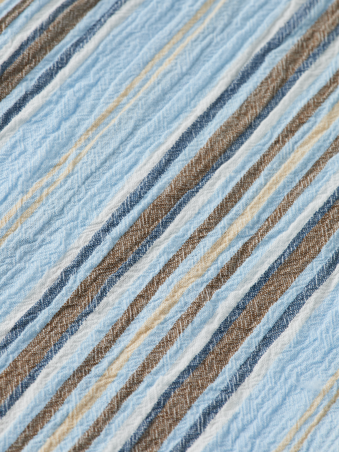 Designed for effortless style, this crinkle-stripe shirt offers a textured finish with a relaxed fit.
100% Cotton