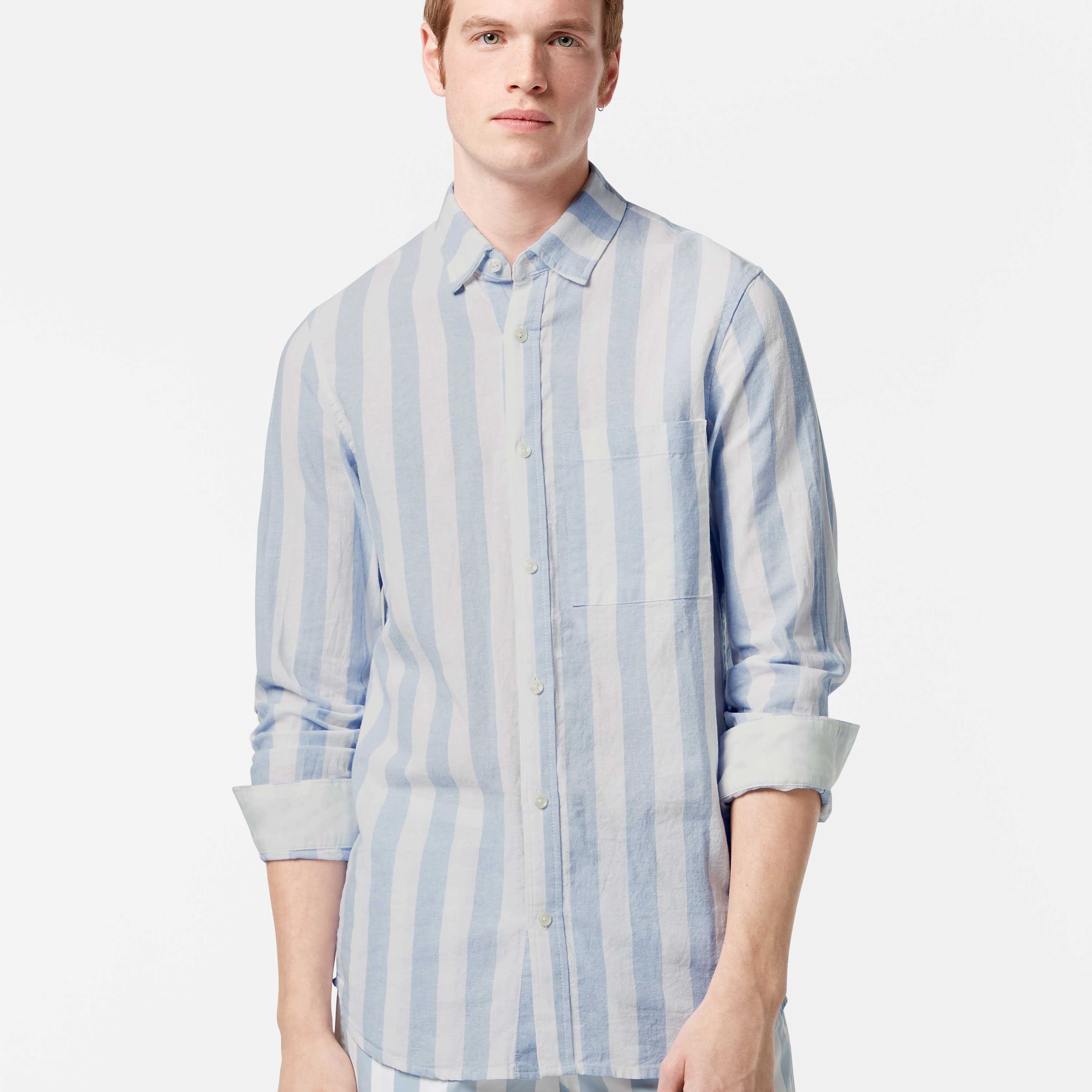 This lightweight long-sleeved seersucker shirt features classic stripes and a textured finish, blending comfort with effortless style.
100% Cotton
Regular fit