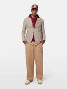 Crafted from a breathable cotton-linen blend, this yarn-dyed blazer delivers timeless style with a relaxed, tailored fit.

81% Cotton, 19% Linen
