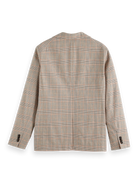 Crafted from a breathable cotton-linen blend, this yarn-dyed blazer delivers timeless style with a relaxed, tailored fit.

81% Cotton, 19% Linen