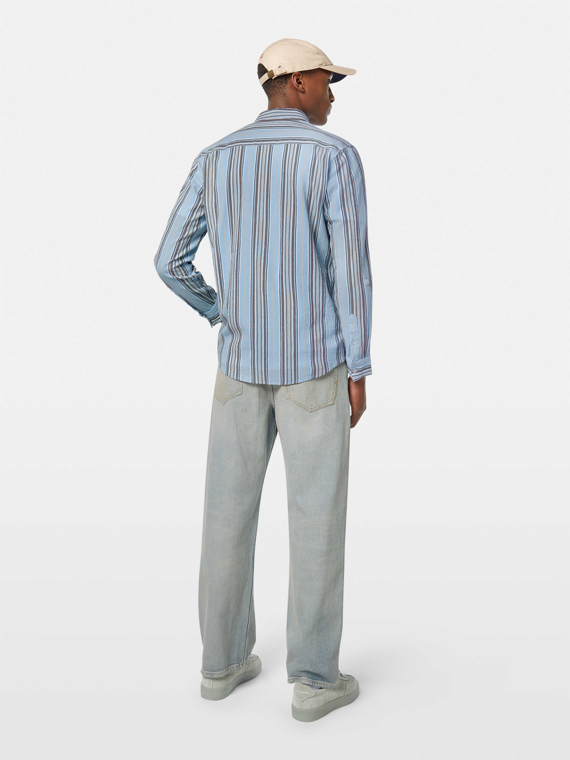 Designed for effortless style, this crinkle-stripe shirt offers a textured finish with a relaxed fit.

100% Cotton