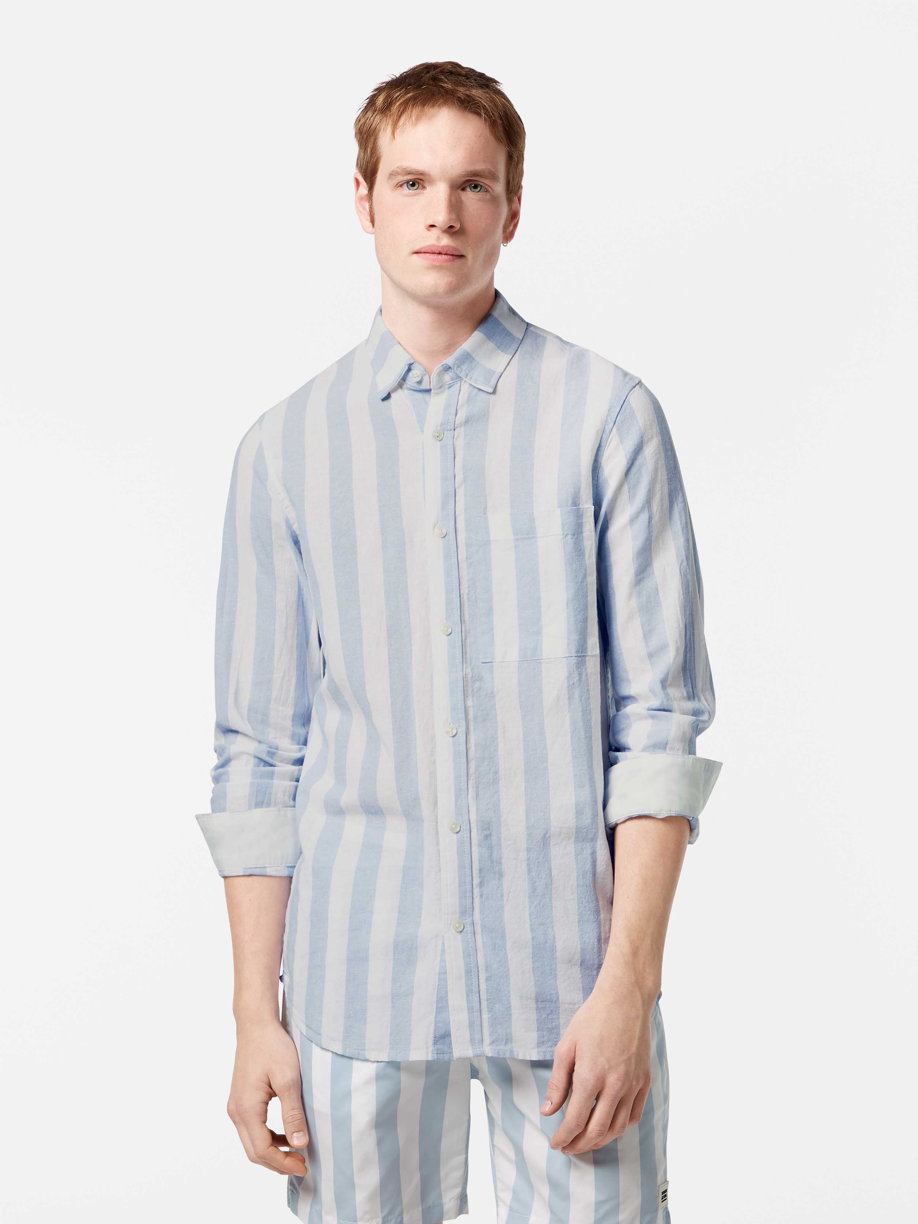 This lightweight long-sleeved seersucker shirt features classic stripes and a textured finish, blending comfort with effortless style.

100% Cotton

Regular fit