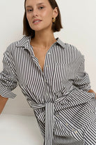 Say yes to timeless stripes with a modern twist, the Forward Black Stripe Shirt Dress blends structure and ease in all the right ways. With its flattering tie waist, crisp collar, and functional pockets, this dress does it all without ever feeling fussy. Throw it on and go, or style it up with your favourite accessories. A true high-low hero, equally perfect for desk days, market strolls or casual catch-ups.

- Classic black and white vertical stripe
- Button-down front with shirt collar
- Removable waist t